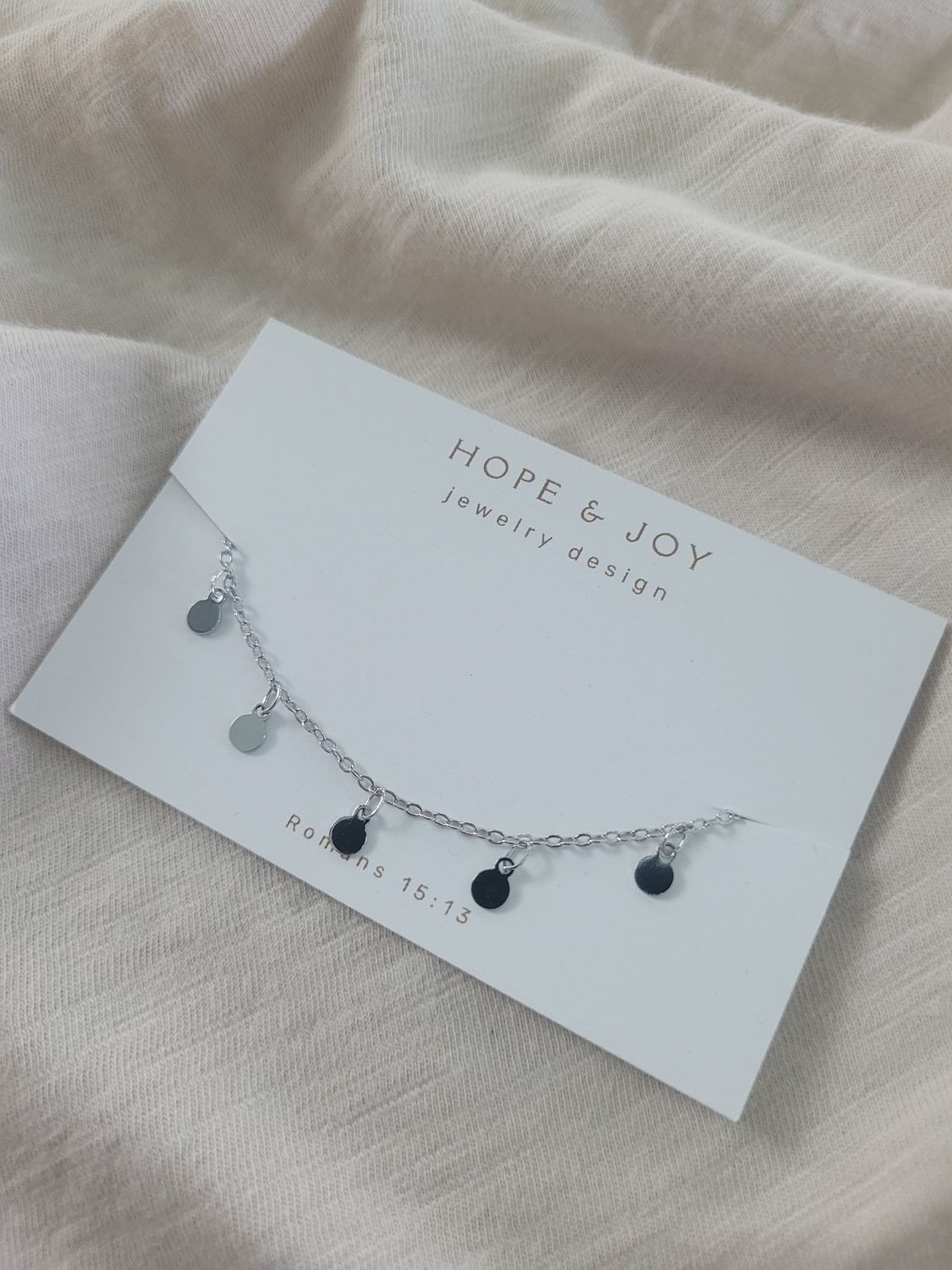 Rhodium-plated Anklet with Disc Charms