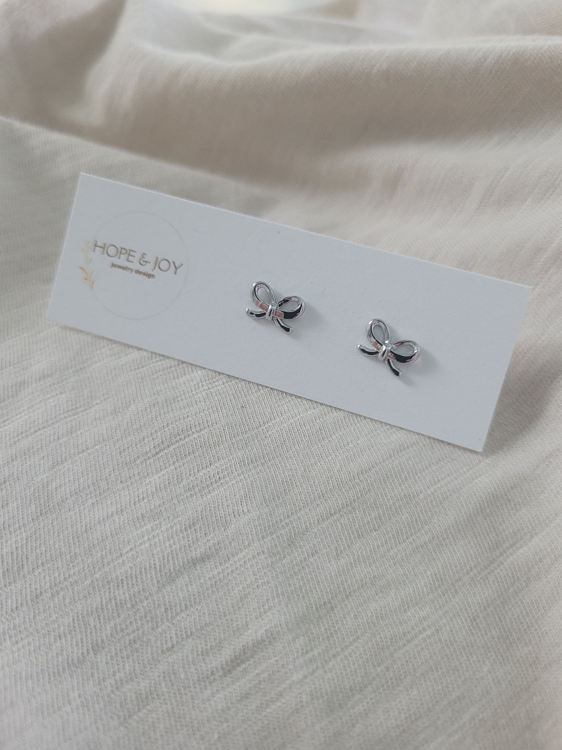 Rhodium-Plated Bow Studs