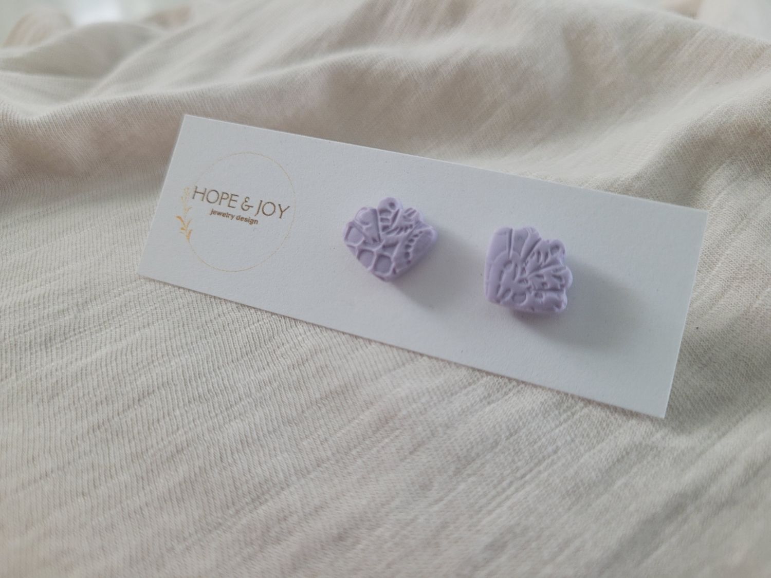 Lilac Embossed Shell Studs