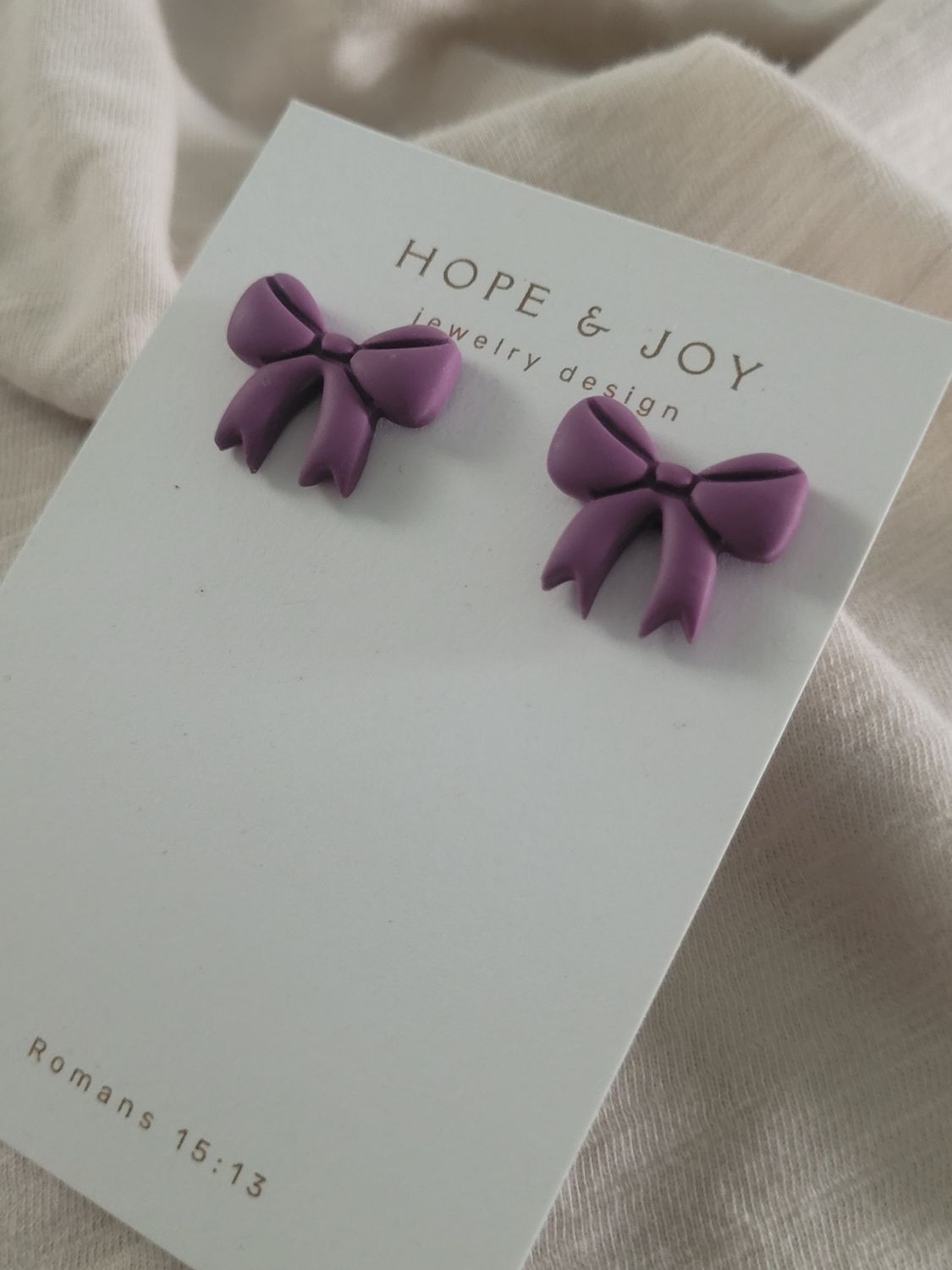 Purple Bow Statement Studs