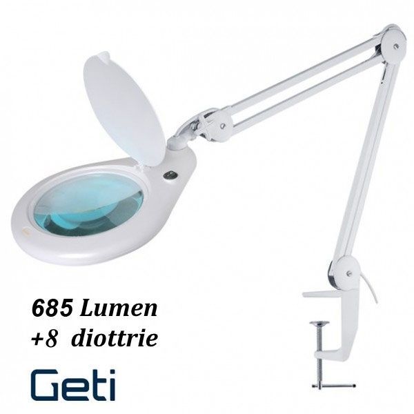 LAMPADA DA LAVORO CON BRACCIO A PANTOGRAFO DI PRECISIONE A 56 LED CON LENTE INGRANDIMENTO 8 DIOTTRIE E COPERCHIO. FISSAGGIO MORSETTO A VITE.