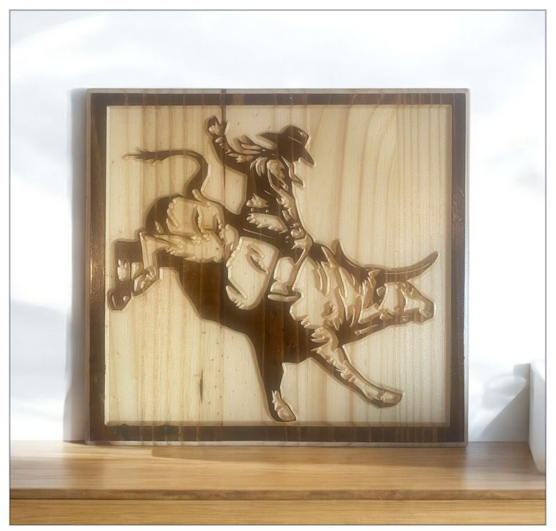 Cowboy Riding Bull