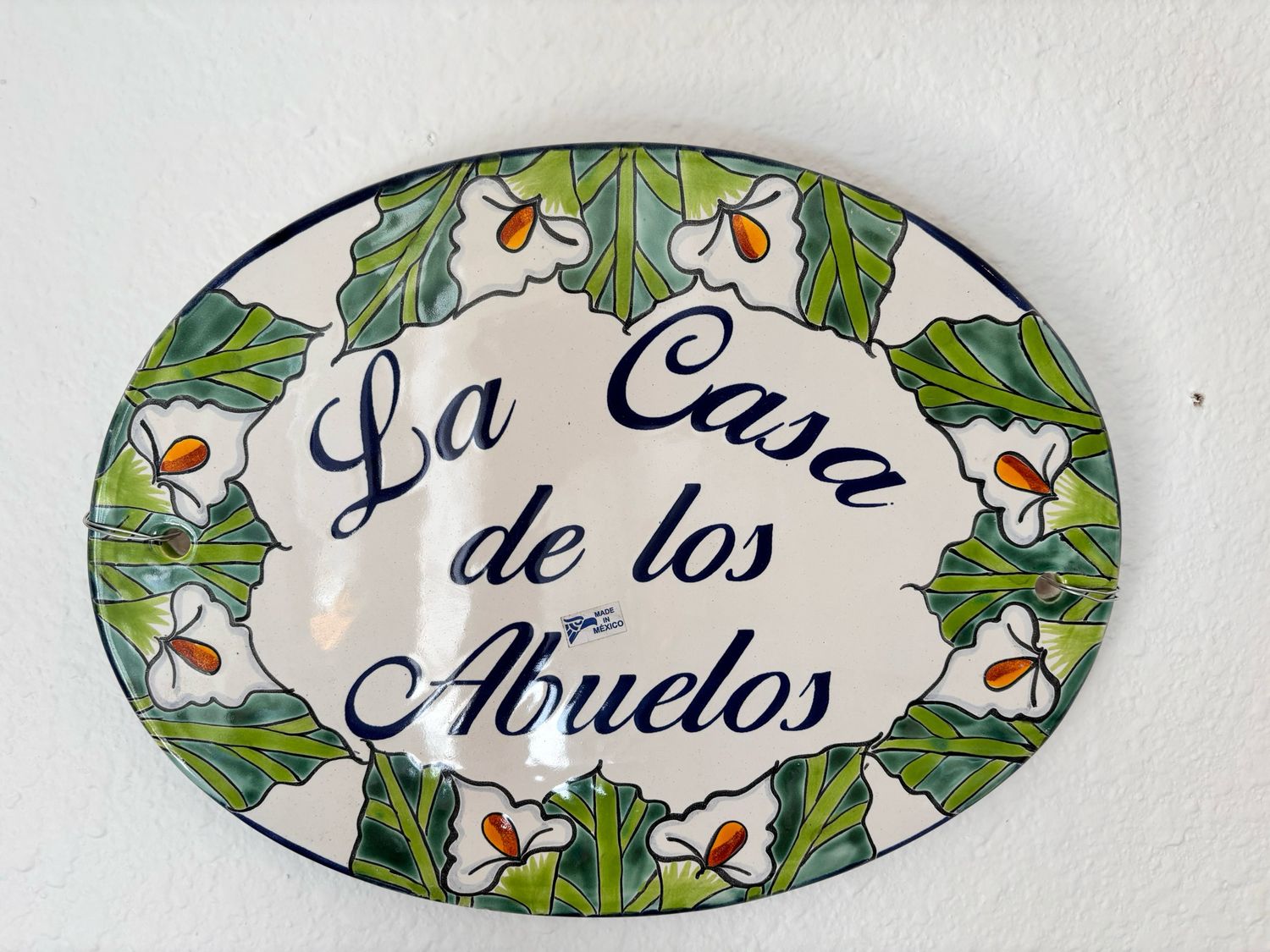 La Casa De Los Abuelos Sign