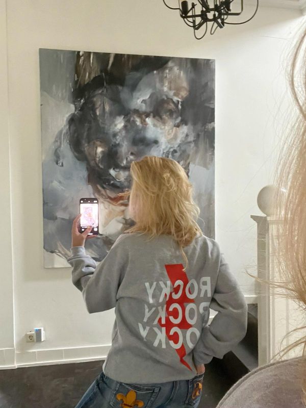 De grijze Rocky sweater