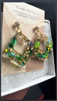 Diamond shaped earrings with Green rhinestones