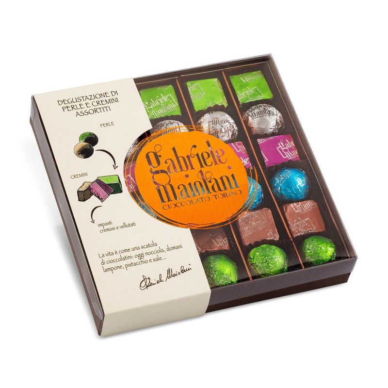 Boîte de perles et creminis assortis