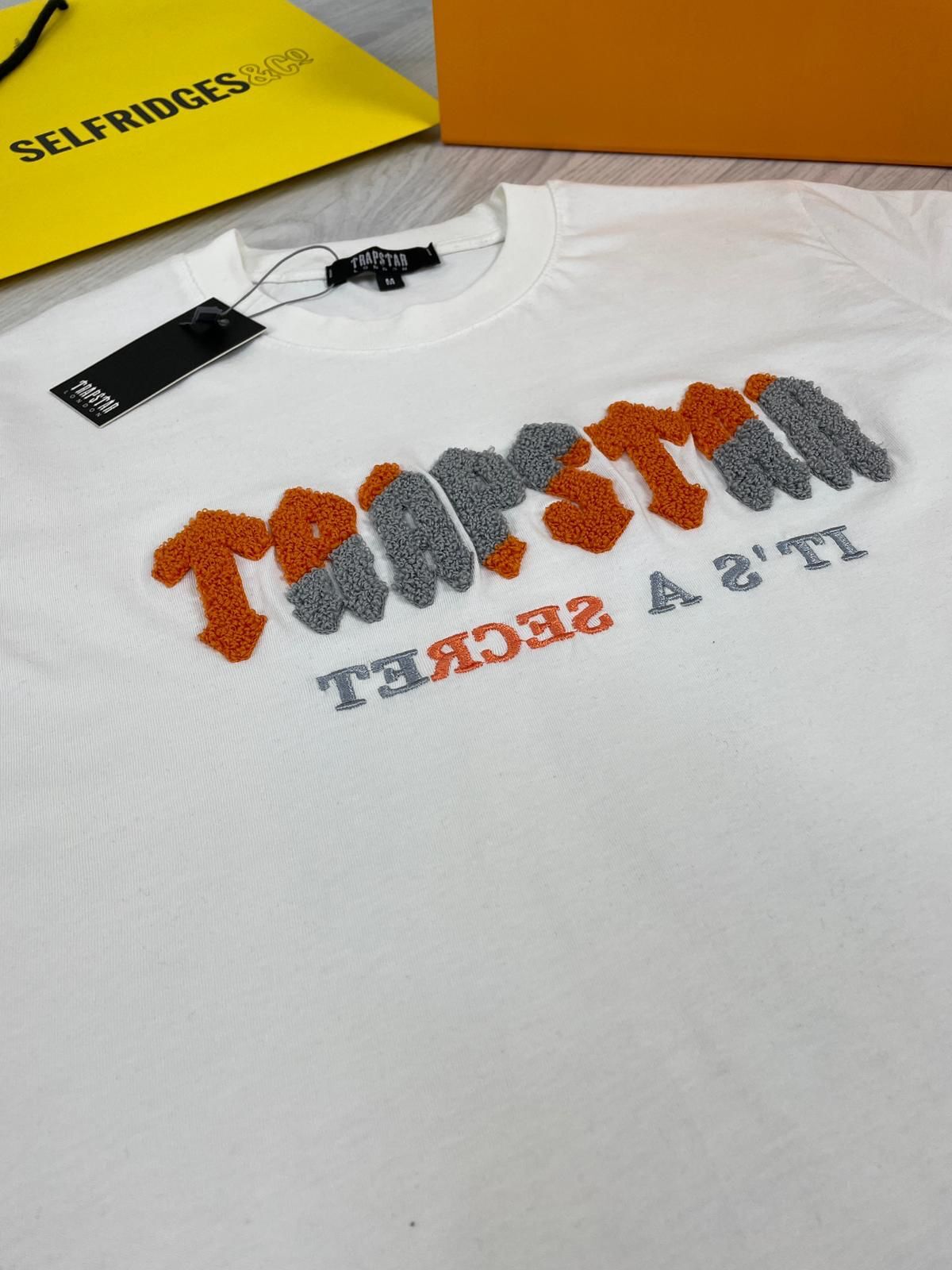 Slim Fit Cheaper Graphic T-Shirt In Replica T Shirt For Men
Trapstar Tee Shirts T-Shirts Fake Cheap Rep Woman Reps T.Shirt T.Shirts Mens Womens Men's Women's First Copy Logo Print Designs Short Sleeves Chenille Decoded Its a Secret White
