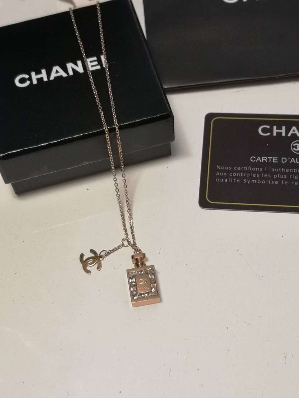 Chanel Women Rose Gold Reps Perfume Pendant Gold Chain Necklace Replica Women Cheap Girls Stylish Design Rep CC Studded Fake EAU DE Pefum Bottle First Copy Fashion Zirconia Jewelry Sale UK 