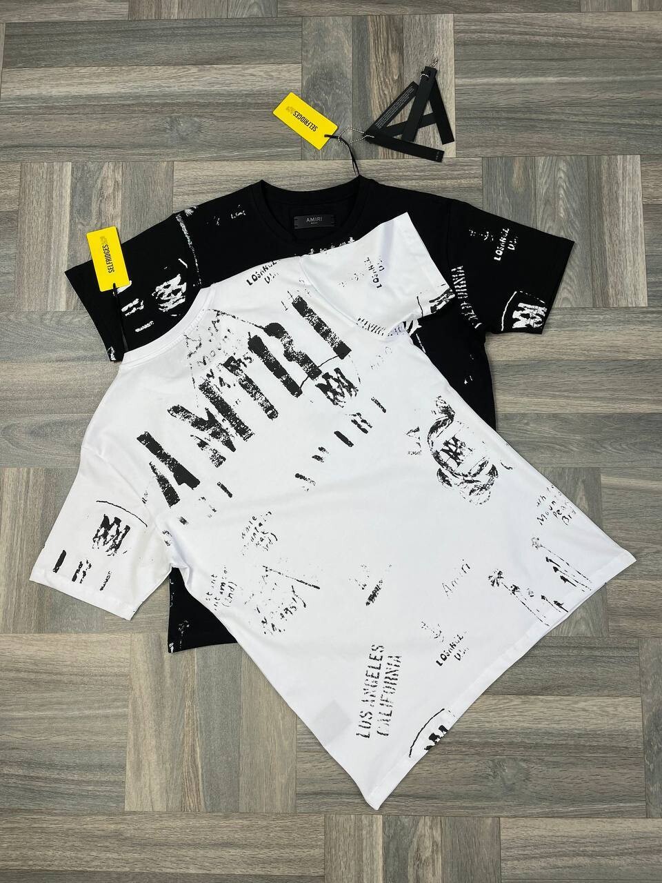 Amiri Men's Women's T-shirts Reps Men Women Replica T-shirt Top Elegantly Design Logo T Shirt Mens Womens Cotton Tee Shirts Rep First Copy Half Sleeve Fake Tshirt Black White Tshirts Sale UK