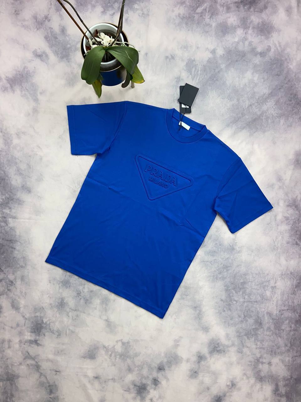 Prada Milano Men's Women's Designer Reps AAA Black T-shirt Sale UK Man Woman First Copy Fakes T-shirt Men's Women's Rep Cheap Price Luxury Tee Shirt 1st Copies Tshirts  1:1 Brand Logo 1 to 1 Tshirts Fake Replica T Shirts Duplicate