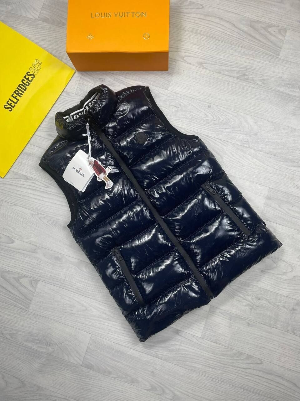 Moncler Logo Men Women Replica Designer Cashmere Flannels Fashion Bodywarmers Fake Reps Men's Women's Zip Pocket First Copy Lavish Shiny Cheap Fabric Sleeveless Rep Jackets Black Sale UK 