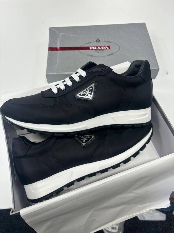 Prada Milano Prax 01 Re-Nylon Logo Sneakers Prada Milano Men's Prax 01 Re-Nylon Black Sneakers Replica Sale UK Men First Copy Designer Sneaker Man Cheap Price Fake Reps Shoes 1st Copies Fakes Rep Trainers 1:1 Luxury Brand Logo Trainer 1 to 1 Runners Designer Shoe AAA Duplicate