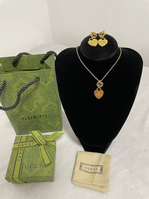 Gucci Women's GG Gold Heart Necklace & Earrings Gucci Women's GG Designer Gold Heart Necklace Earrings AAA Sale UK Woman Fashion Luxury Jewellery First Copy Cheap Price Replica Elegant Reps 1:1 Fakes Jewlry Fake Rep Brand Logo 1st Copies Ladies Girls Lady Necklaces Original Duplicate