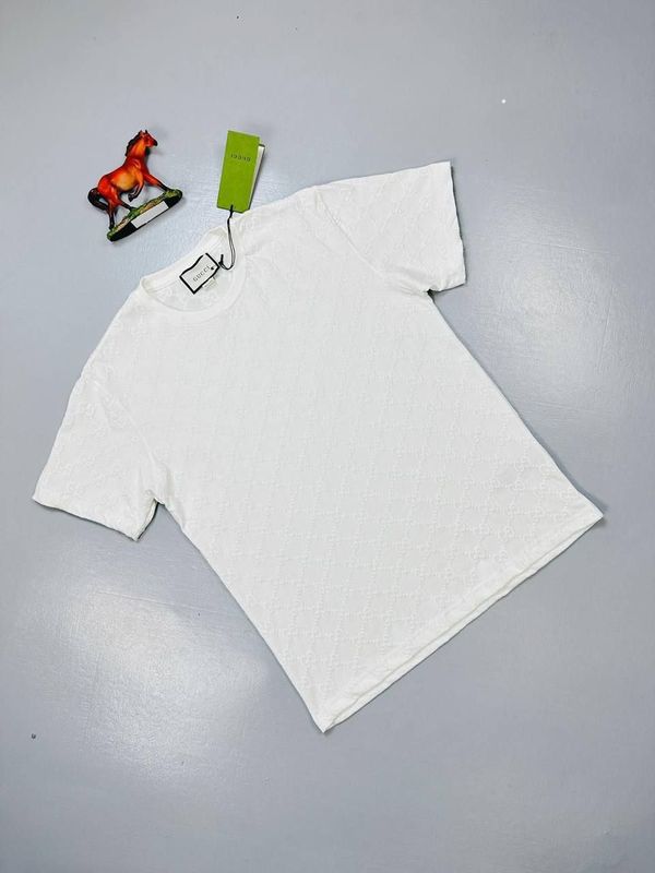 Gucci Regular Fit Men's Women's White T-Shirt Gucci Regular Fit Mens Womens White T-shirt Best AAA Sale UK Men's Women's Cheap Price Rep T-shirts Short Sleeve Tee Shirts Man Woman First Copy Replica Brand Logo GG 1st Copies T Shirt Round Neck Tshirts Fake Reps Unisex White Tshirt