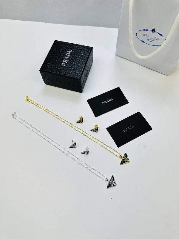 Prada Milano Triangle Logo Necklace Earrings Prada Milano Women's Designer Silver Gold Necklace Earring Fakes Sale UK Woman First Copy Replica Necklaces Earring Women's Cheap Price 1st Copies Fake Reps 1:1 Triangle Brand Logo Luxury Rep Jewellery 1 to 1 Jewlery AAA Jewlry Duplicate