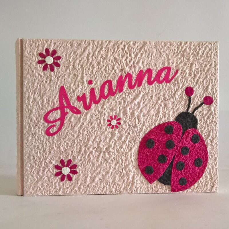 Album fotografico rosa con coccinella e nome