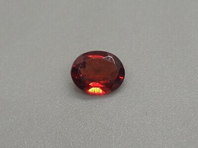 AFRICAN RUBY OVAL CUT .65 CTS