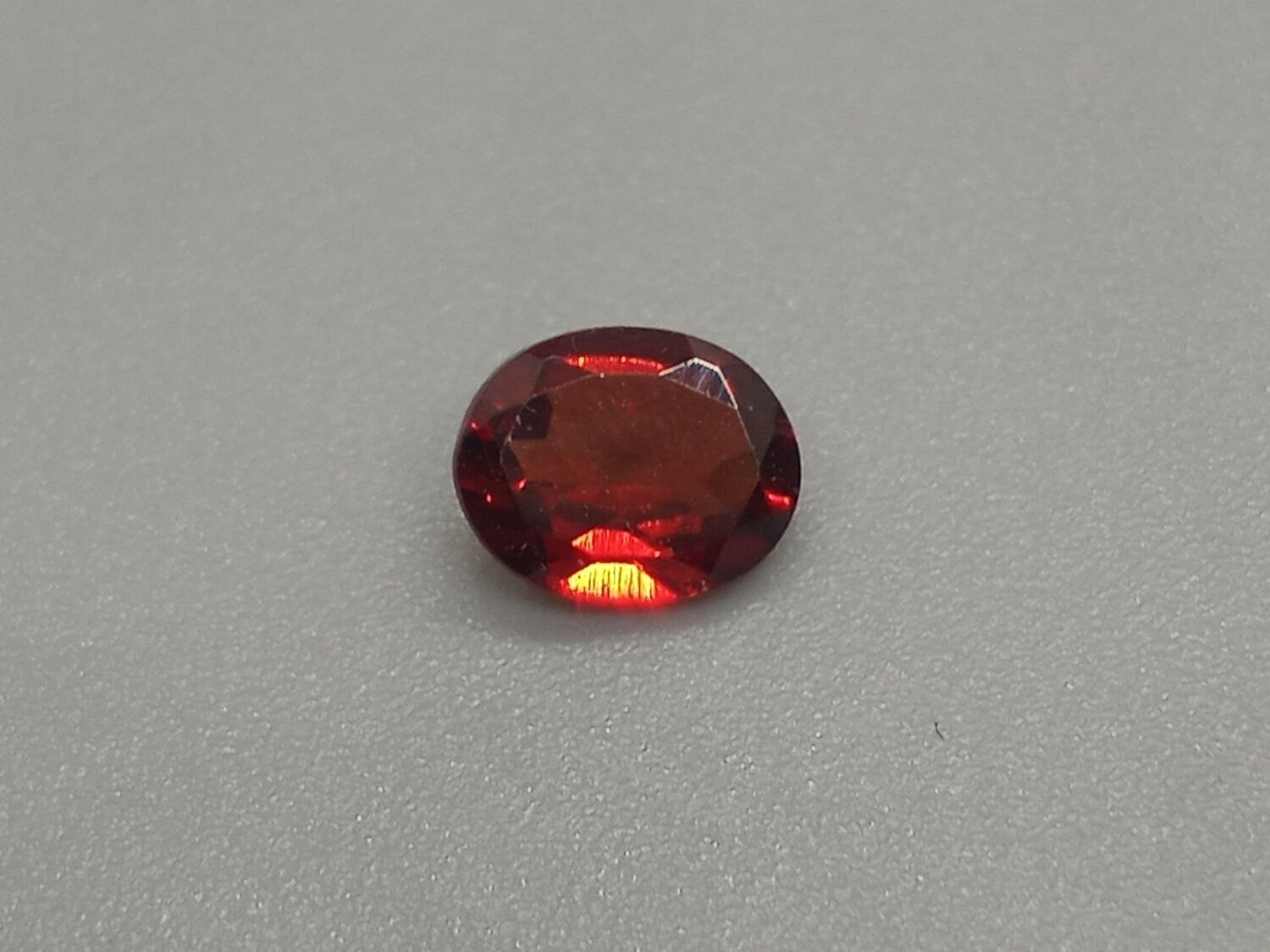 AFRICAN RUBY OVAL CUT .65 CTS