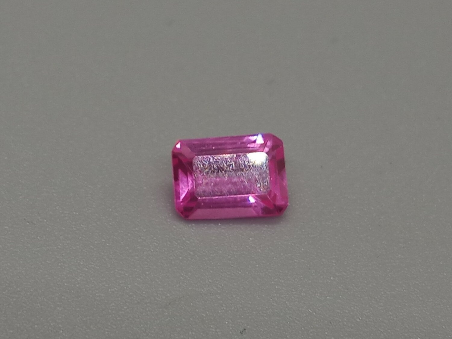 SAPPHIRE, RED, EMERALD CUT, 1.35 CTS