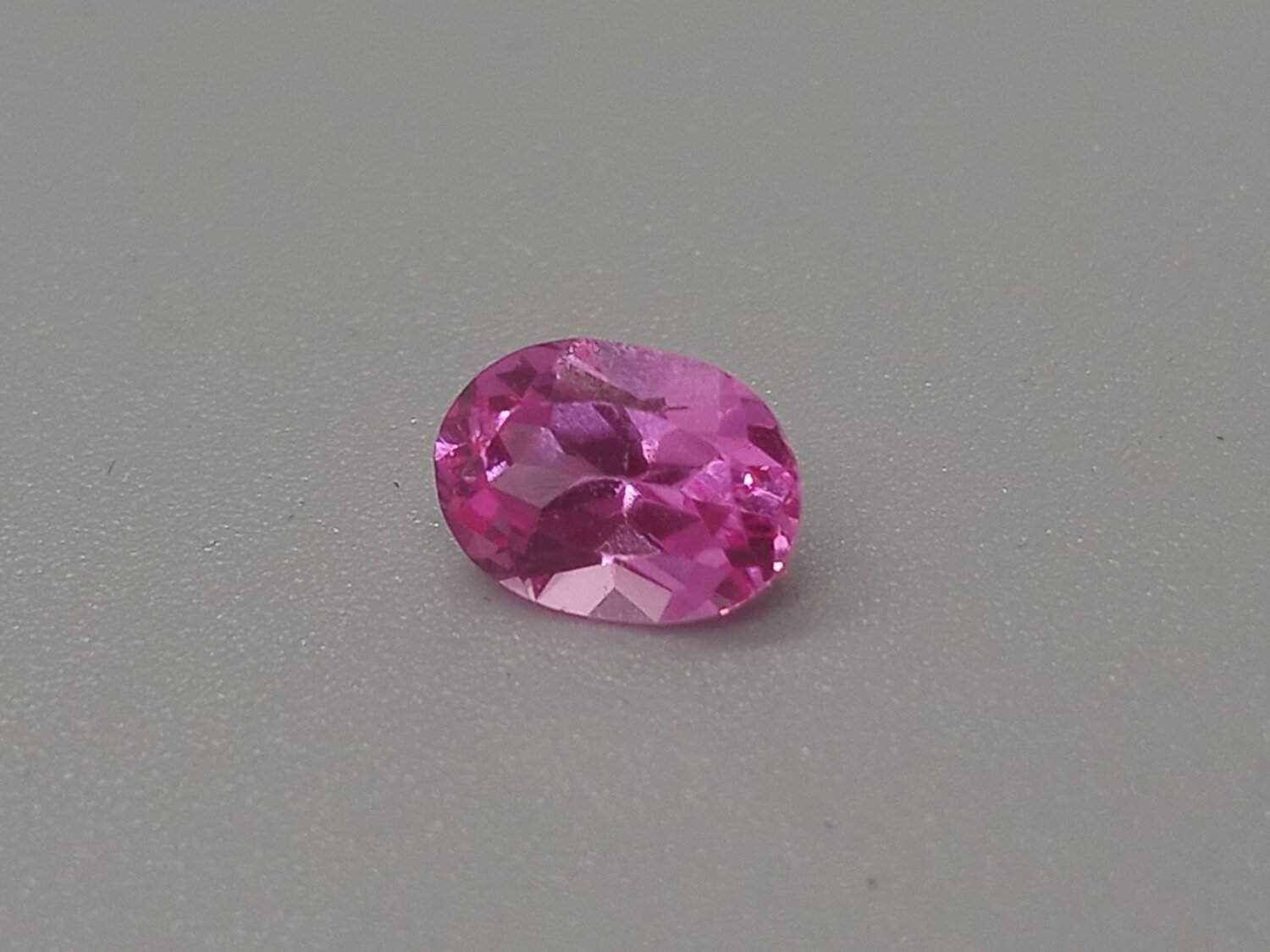SAPPHIRE, RED, OVAL CUT, 0.95 CTS