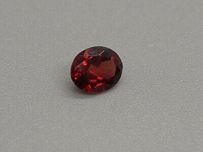 AFRICAN RUBY OVAL CUT .60 CTS