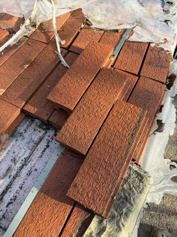 Corium Brick Slips cladding system Red Faced