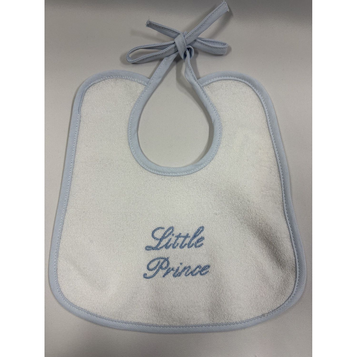 WHITE TERRY BIB LITTLE PRINCE EMBRODERY BLUE EDGE TRIM