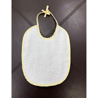 WHITE TERRY BIB ASSORTED COLORED EDGING