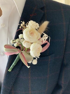 Triple white peony in bloom boutonniere