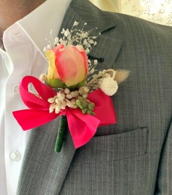 Playful pink peony boutonniere w/ dried accents