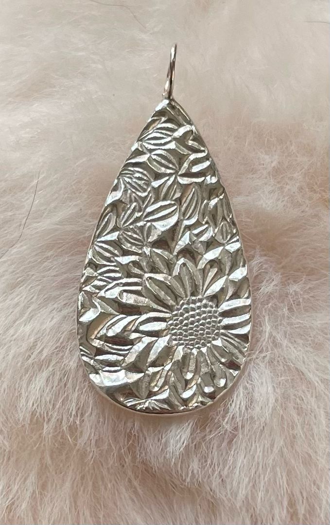 Teardrop shaped sunflower pendant