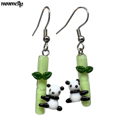 Mmmelty™ Earrings (Pandas)
