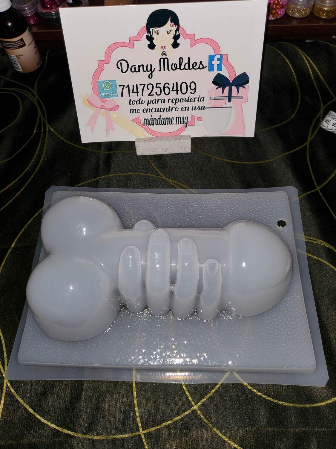Hand holding Molds