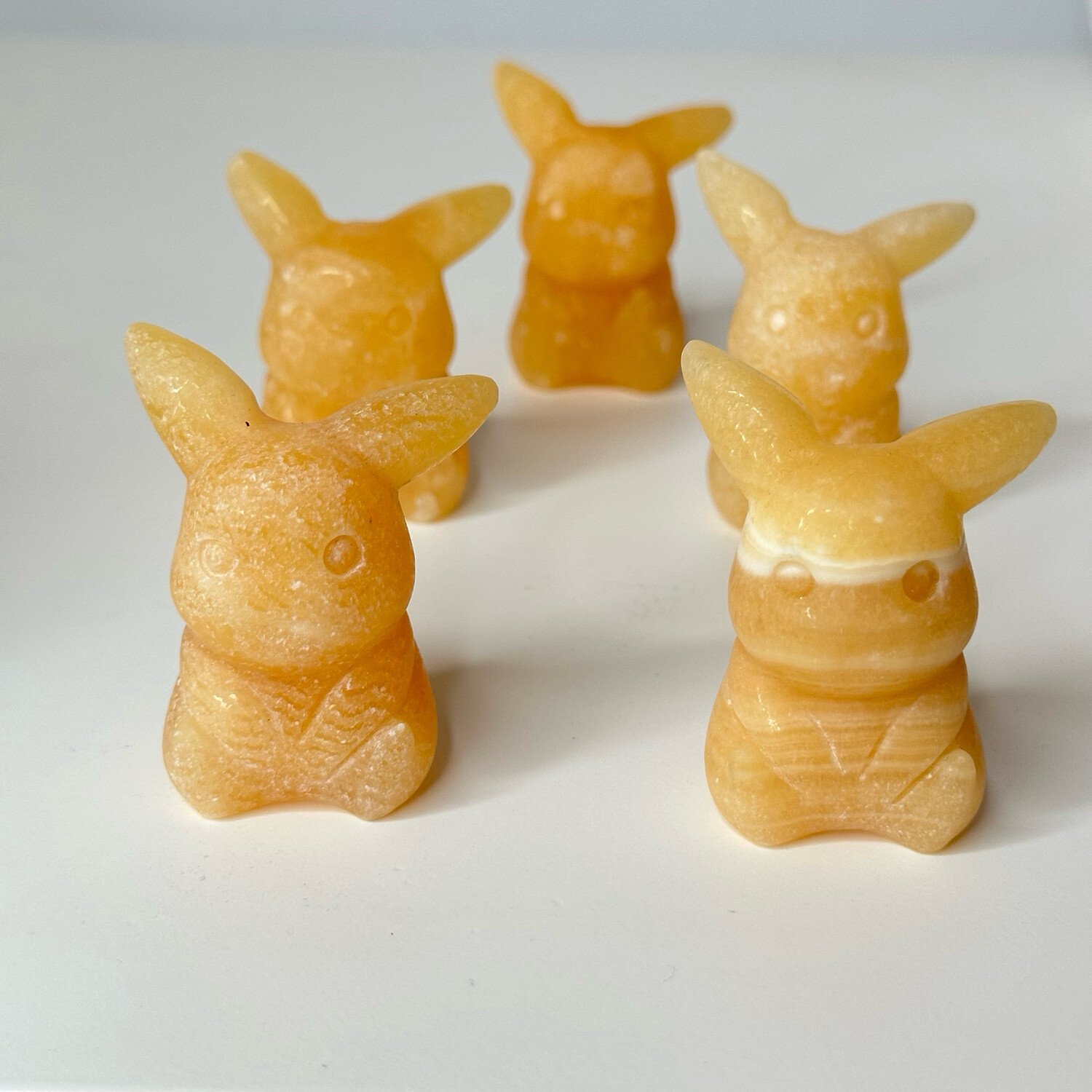 Honey Calcite Pika Carving