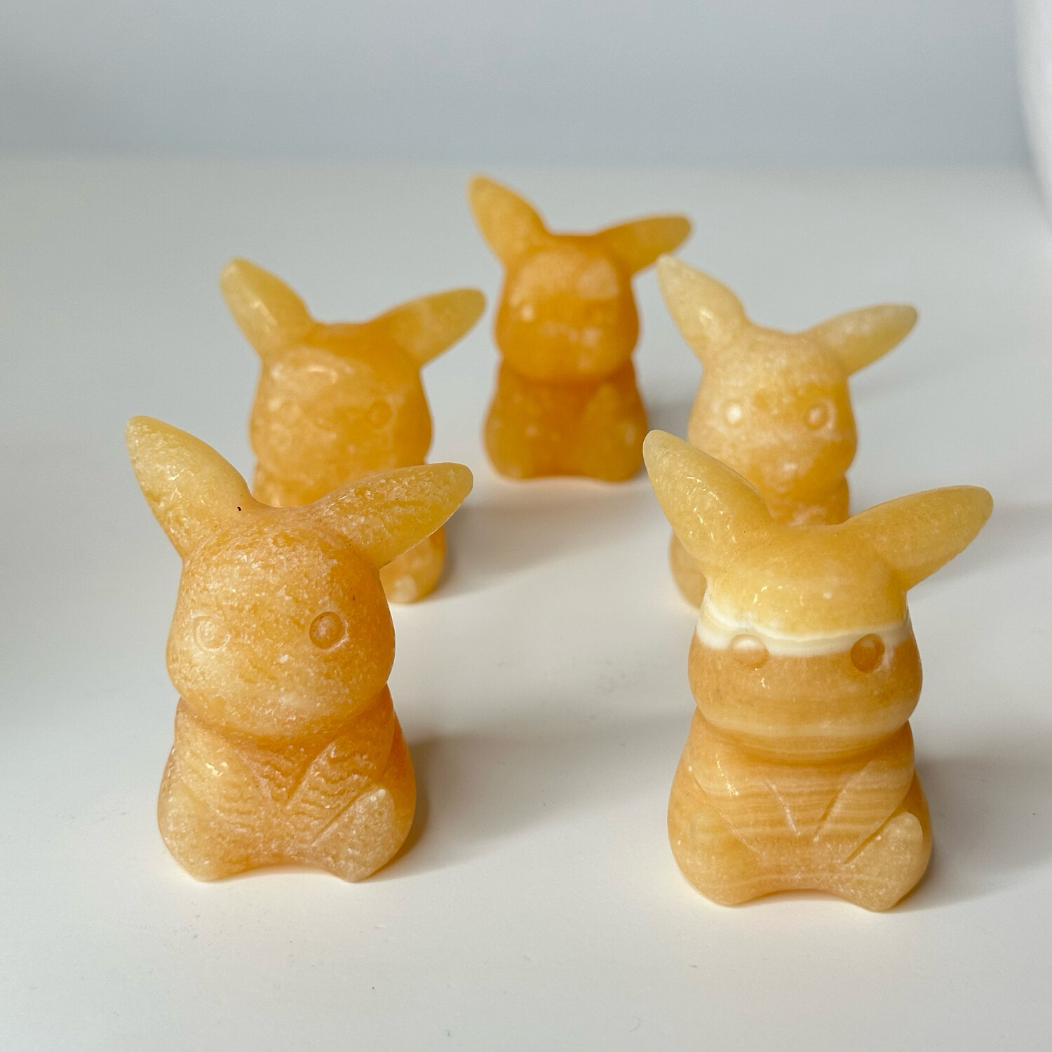 Honey Calcite Pika Carving