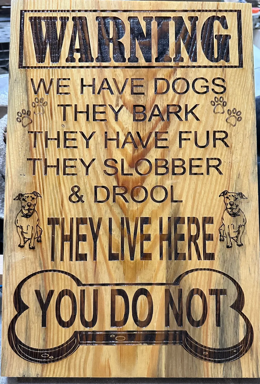 Warning dogs live here sign