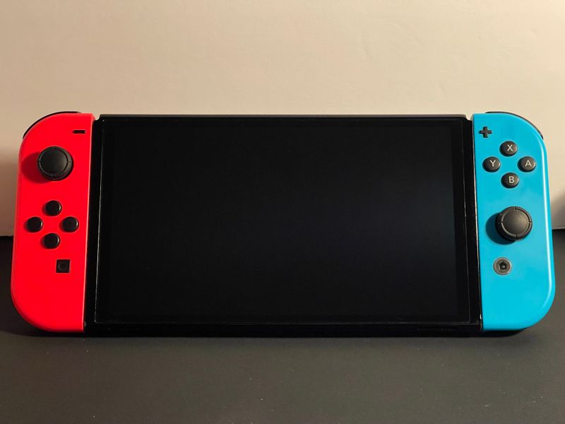 Nintendo Switch OLED 64GB HEG-001 Console + Joy-Cons + Power Adapter Nintendo Switch OLED 64GB HEG-001 Console + Joy-Cons + Power Adapter