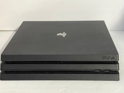 Sony PlayStation 4 Pro 1TB Console with PS4 Dualshock 4 Controller and Choice of Games Sony PlayStation 4 Pro 1TB Console with PS4 Dualshock 4 Controller and Choice of Games