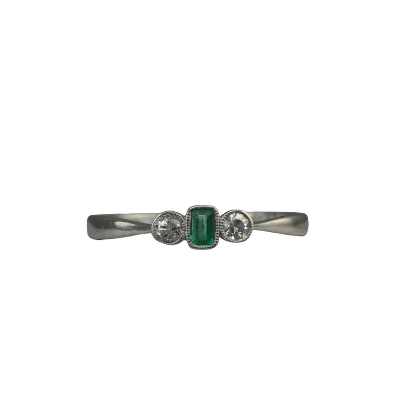 Vintage emerald and diamond petite three stone ring.