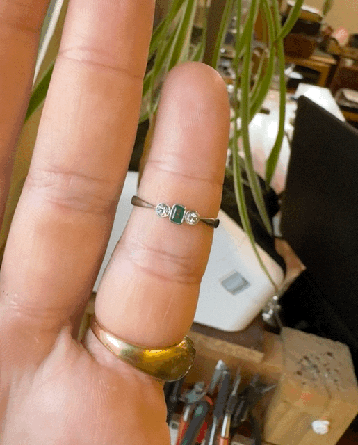 Vintage emerald and diamond petite three stone ring.