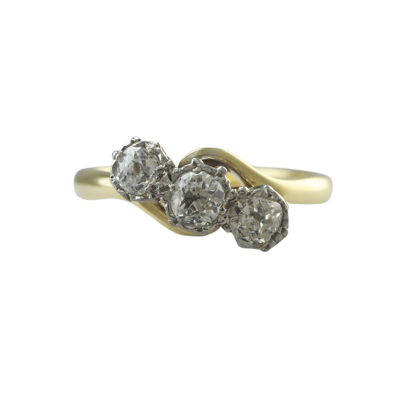 18ct, Platinum and Diamond Three Stone Cross Over Ring