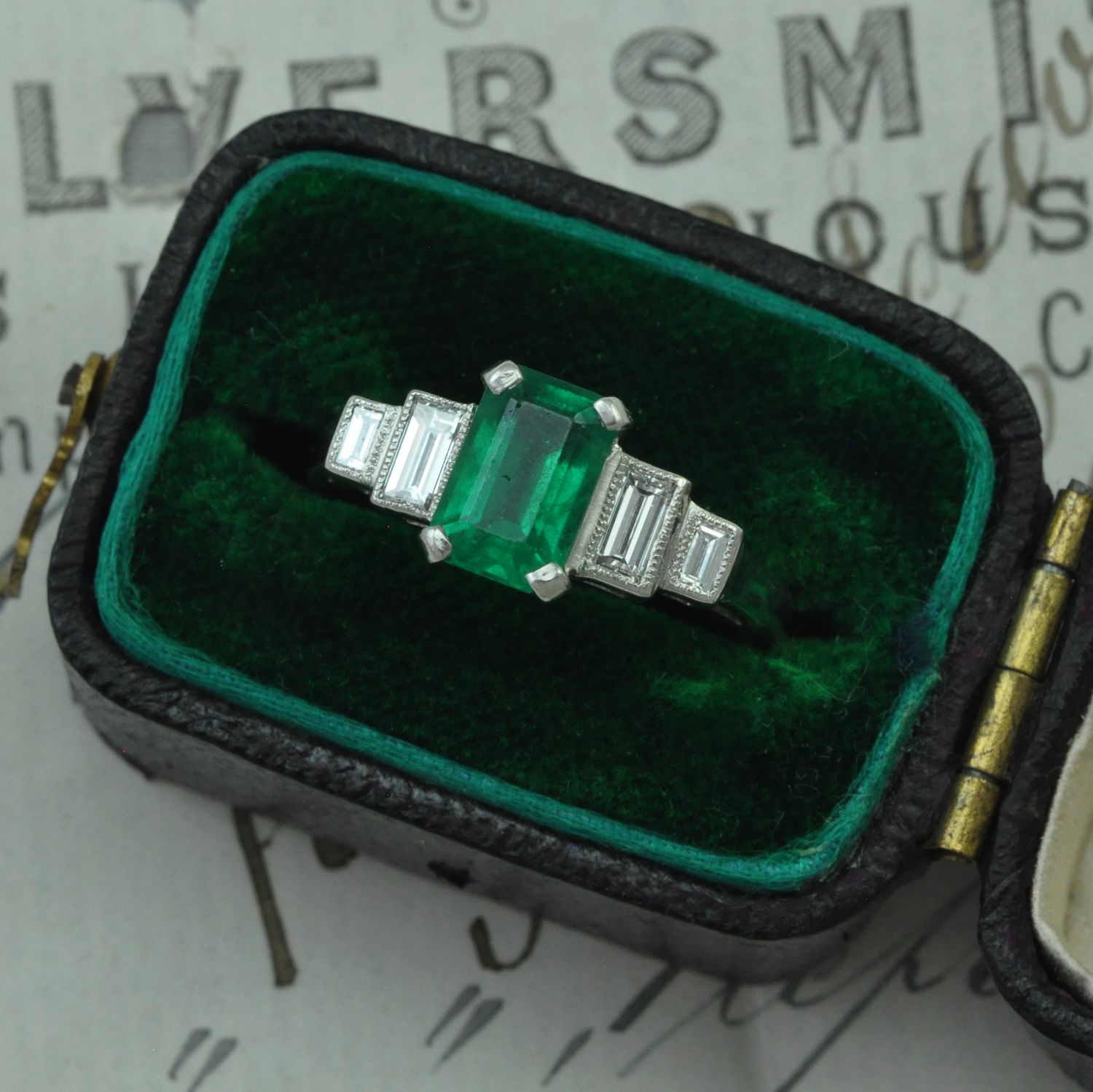 Contemporary Platinum Emerald & Diamond Ring