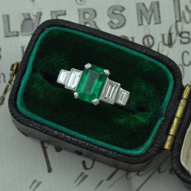 Contemporary Platinum Emerald & Diamond Ring