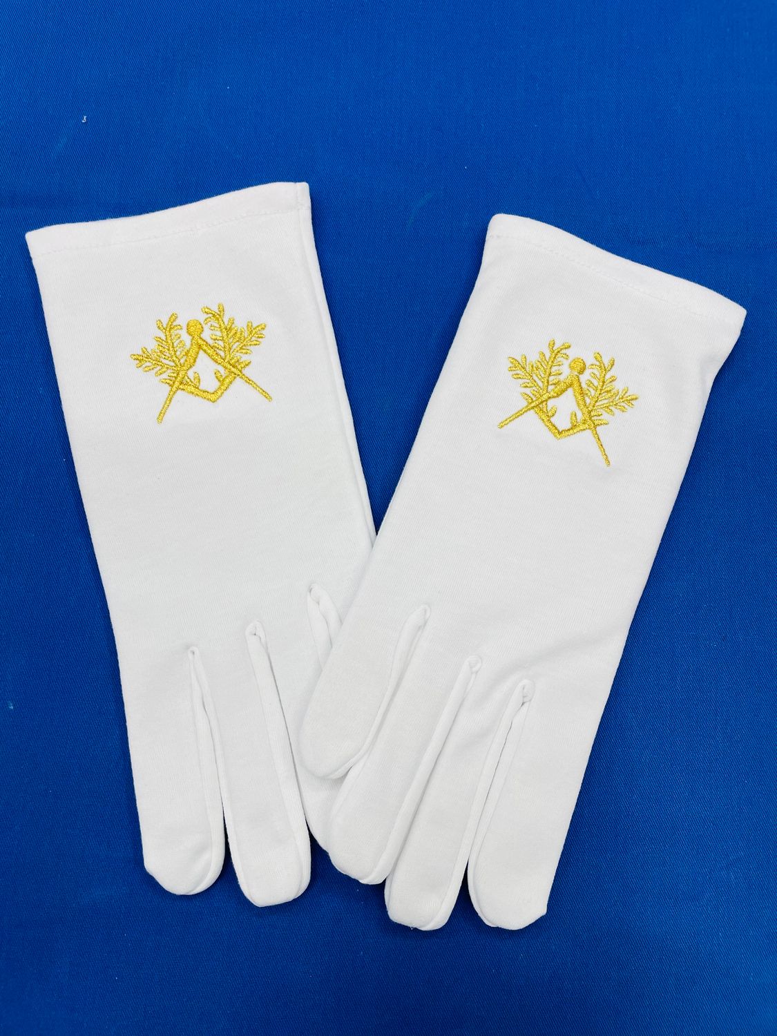 Guanti bianco cotone logo oro