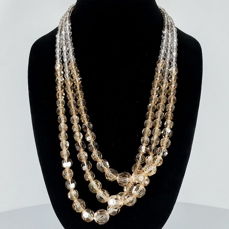 Multi‑Strand Gold Crystal Statement Necklace