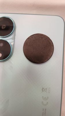 Dischetto in pietra shungite che contrasta naturalmente l'elettrosmog