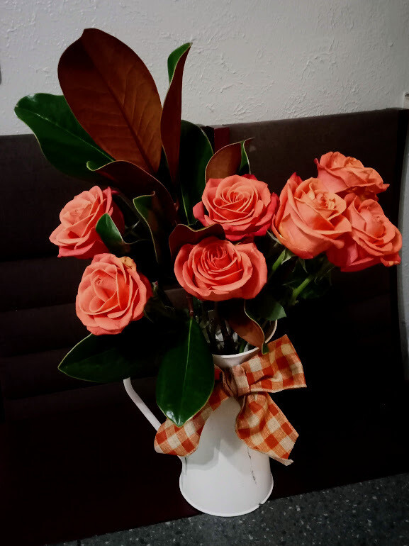 Pink roses In white vase
