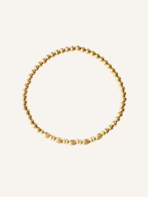Hübsches flexibles Boho-Chic-Armband aus wasserfesten Edelstahlperlen. Ein zeitloser Hingucker in Gold, perfekt zum Kombinier