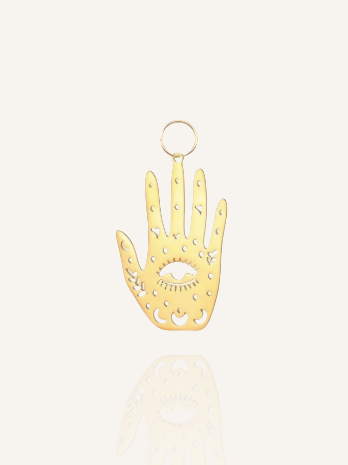 Ein goldener Anhänger in Form einer Hand aus Edelstahl. Anhänger für Ohrringe und Halsketten. Bunter Schmuck