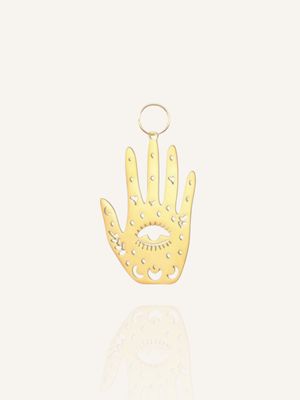 Ein goldener Anhänger in Form einer Hand aus Edelstahl. Anhänger für Ohrringe und Halsketten. Bunter Schmuck